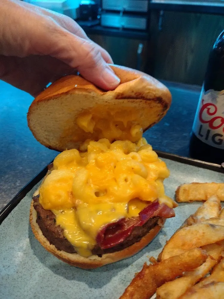 Bacon Cheeseburger with Mac and Cheese on It and Fries